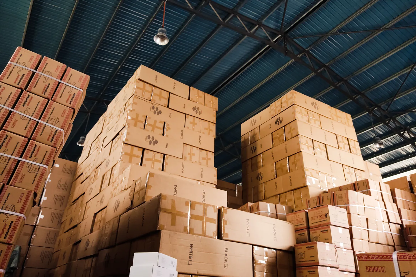 Organised cartons stored inside a commercial warehouse